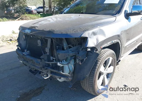 2014 Jeep Grand Cherokee Overland из США, поврежденный, VIN 1C4RJFCG1EC326380